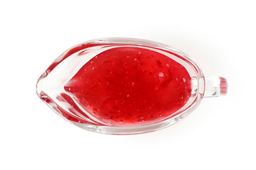 Sauce boat with cranberry sauce isolated on white background