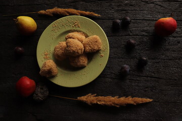 traditional rustic autumn dessert with plums and breadcrumbs