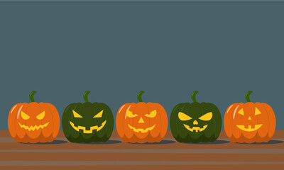 Pumpkin Jack in a row with scary faces. Halloween pumpkins are in a row