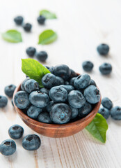 Blueberries on old wooden background
