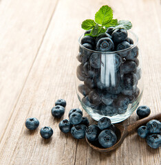Blueberries on wooden background