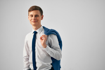 business man in shirt with tie jacket on his shoulders self-confidence success professional