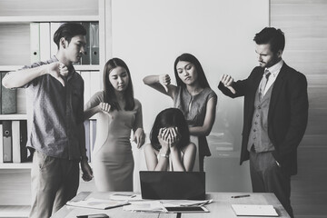 Manager and her team complaining to business woman by pointing to him for mistake work.