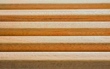 Wooden pencils texture background. Top view.