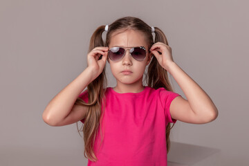beautiful girl in sunglasses. advertising children's glasses