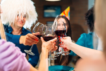 Party at a restaurant. Friends have fun in a restaurant and drink wine. festive mood.