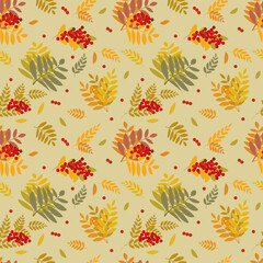 Autumn seamless pattern in a floral theme for fabrics and autumn backgrounds. Bright twigs, leaves and berries of mountain ash on a beige-yellow background. Vector illustration