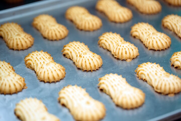 Shortbread.  Production of shortbread cookies at a confectionery factory.  Shortbread cookies on a...
