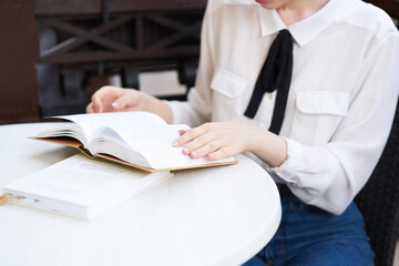 female in a summer cafe on the street vacation in the city summer communication