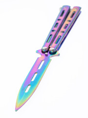 rainbow metal folding toy iridescent unsharpened knife on white background