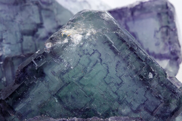 Macro mineral stone Fluorite on white background close up