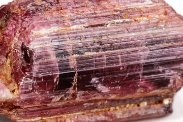 Macro mineral tourmaline stone on white background