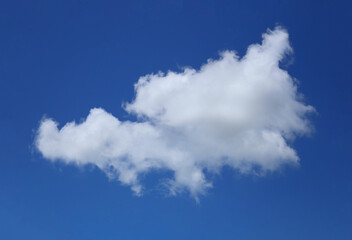 Blue sky with white clouds in the daytime background.