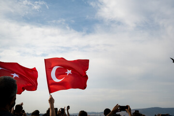 Liberty day of Izmir, People have Turkish flags on their hands. Gundogdu Square