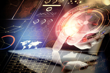 Double exposure of man's hand holding and using a digital device and data theme hologram drawing. Technology concept.