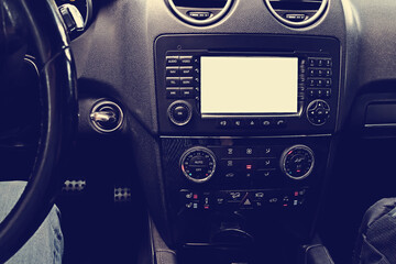 Vintage toned image of a car interior.