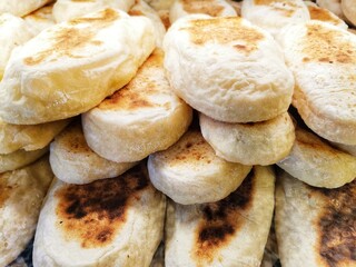 Flatbread. Bakery bread. Small bread.