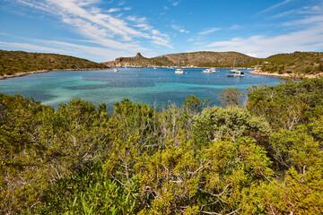 Turquoise waters in Cabrera island shoreline landscape. Balearic archipelago. Spain
