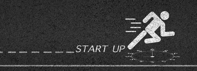 The startup, small business owner on the asphalt road, get ready on starting the highway concept for business planning.