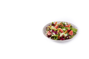 Figs salad with cheese and walnuts isolated on white background. Copy space