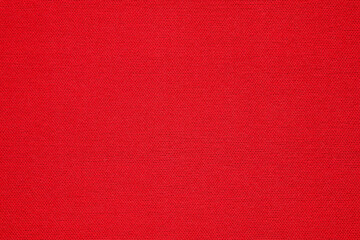 Red fabric texture background close up