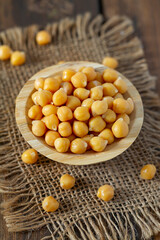 chickpeas on brown wooden surface