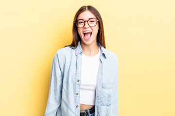 hispanic pretty woman with a big, friendly, carefree smile, looking positive, relaxed and happy,...