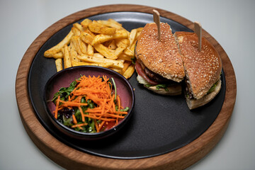 Craft beef burger and French fries 