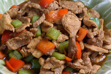 Close-up view stir fried pork with black pepper