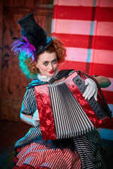 clowness playing the accordion