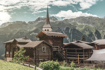 Historic village centre in Bellwald with tower of the parish church