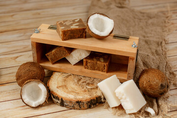 Fototapeta na wymiar Natural handmade coconut soap with flowers, spa organic soap