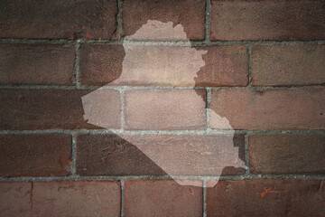 Fototapeta premium map of iraq on a old brick wall