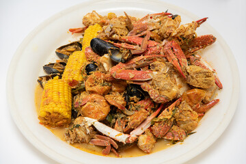 Homemade Cajun Seafood Boil with Lobster Crab and Shrimp with rice - Powered by Adobe