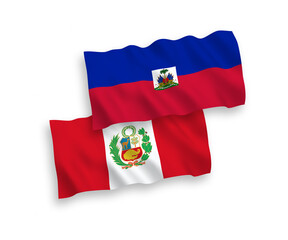 National vector fabric wave flags of Republic of Haiti and Peru isolated on white background. 1 to 2 proportion.