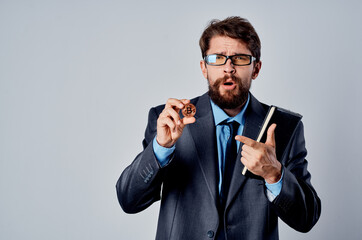 business man in a suit cryptocurrency bitcoin research technology electronic wallet