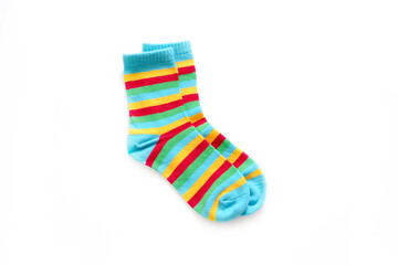 children's socks made of natural cotton with a bright multicolored stripe. white background