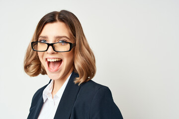 Businesswoman with glasses executive light background emotions