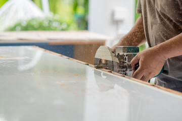 cutting wood for building, Wood drill, carpenter, worker
