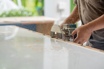 cutting wood for building, Wood drill, carpenter, worker
