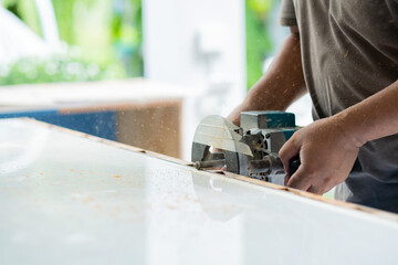 cutting wood for building, Wood drill, carpenter, worker
