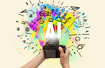 Close-up of a hand holding digital camera with abstract drawing