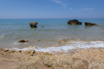 View from a beach in Agios Gordios resort village on Corfu Island, Greece