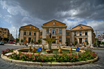 A square with the buildings of a primary school in Lavello, an old town in the Basilicata region.