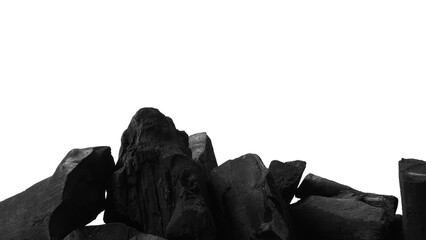 Obraz premium Wood charcoal. Black Charcoal on black textured floor. Used for cooking grill or other industries. Natural wood charcoal. Black carbon reesidue produced by strongly heating wood. for traditional BBQ