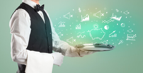 Handsome young waiter in tuxedo holding money icons on tray