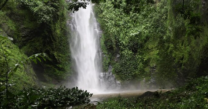 Tagbo Falls tropical rainforest pool Volta Ghana Africa. Waterfall Mount Afadjato, Ghana highest mountain. Eastern Region border of Togo. Hike through cocoa plantation, forest and tropical rainforest.