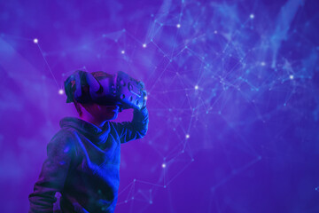 Child with virtual reality glasses in 3D environment
