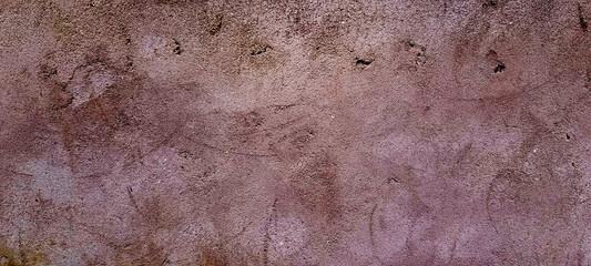 Horizontal concrete wall. Lightly pink cement background