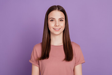 Portrait of yong woman smile over violet background